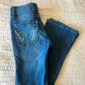 Girls’ size 7 slim Wrangler jeans; only worn twice.